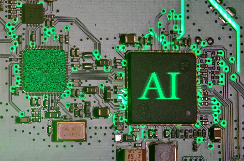 Image of a circuit board with "AI" on a chip. This represents AI privacy and security issues.